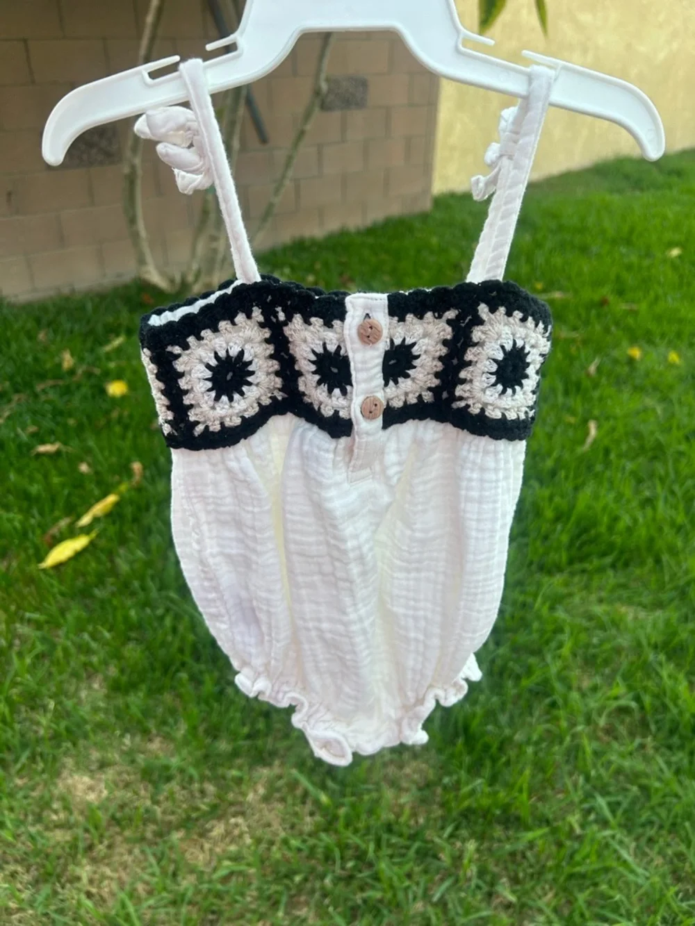 Old Navy White Baby Romper with Black and Cream Crochet Trim